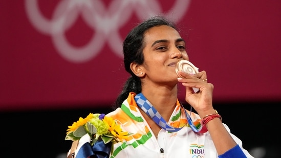 Bronze medalist Pusarla V. Sindhu celebrates during the medal ceremony for women's singles Badminton match at the 2020 Summer Olympics, Sunday, Aug. 1, 2021, in Tokyo, Japan. (AP Photo/Markus Schreiber)(AP)