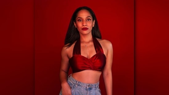 In this photo, Masaba styled her mom jeans with a burgundy crop top.  With bold red lips and hair left open, Masaba looked like a boss ready to take on the world.  (Instagram/@masabagupta)