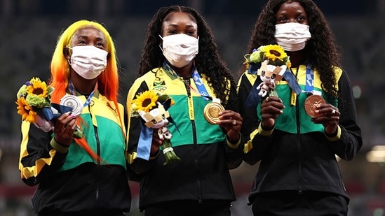 From Left: Silver medalist Shelly-Ann Fraser-Pryce, gold medalist Elaine Thompson-Herah and bronze medalist Shericka Jackson of Team Jamaica. (Getty Images)