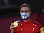 Olympics: Denmark's Viktor Axelsen wins badminton gold to break Asian stranglehold.