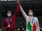Joint gold medalists Mutaz Barshim of Qatar and Gianmarco Tamberi (R) of Italy pose for a photo following the men's high jump final at Tokyo Olympics(AP) Joint gold medalists Mutaz Barshim of Qatar and Gianmarco Tamberi (R) of Italy pose for a photo following the men's high jump final at Tokyo Olympics(AP)
