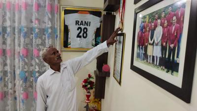 Skipper Rani Rampal’s father showing her medals at their home in Shahbad of Kurukshetra. (HT FILE) Skipper Rani Rampal’s father showing her medals at their home in Shahbad of Kurukshetra. (HT FILE)
