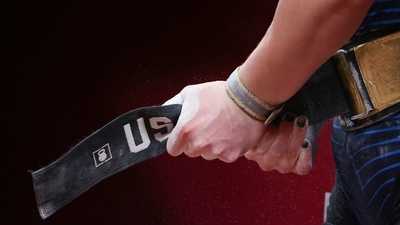 Tokyo 2020 Olympics - Weightlifting - Women's 87kg - Group A - Tokyo International Forum, Tokyo, Japan - August 2, 2021. Martha Rogers of the United States adjusts her belt. REUTERS/Edgard Garrido (REUTERS)