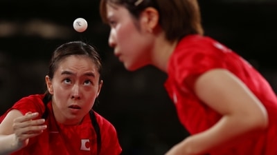 Tokyo 2020 Olympics - Table Tennis - Women's Team - Quarterfinal - Tokyo Metropolitan Gymnasium - Tokyo, Japan - August 2, 2021. Kasumi Ishikawa of Japan and Miu Hirano of Japan in action against Chen Szu-Yu of Taiwan and Cheng Hsien-Tzu of Taiwan REUTERS/Luisa Gonzalez (REUTERS)
