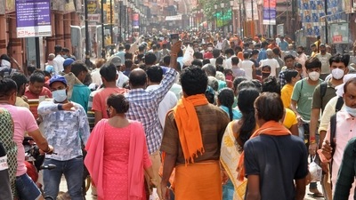 As per tradition, devotees collect gangajal (Ganga water) from the river and walk to the temple to offer the water to the deity. (ANI Photo) As per tradition, devotees collect gangajal (Ganga water) from the river and walk to the temple to offer the water to the deity. (ANI Photo)