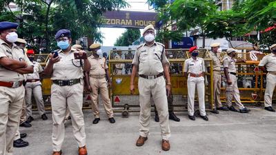 Assam security personnel stand vigil outside the Mizoram House in Guwahati after the recent border clashes with neighbouring Mizoram. (PTI PHOTO.) Assam security personnel stand vigil outside the Mizoram House in Guwahati after the recent border clashes with neighbouring Mizoram. (PTI PHOTO.)