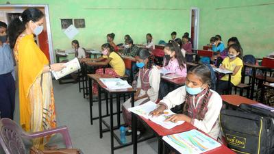 Children attending classes at a government school in Phase 3B1, Mohali, on Monday. (RAVI KUMAR/HT)