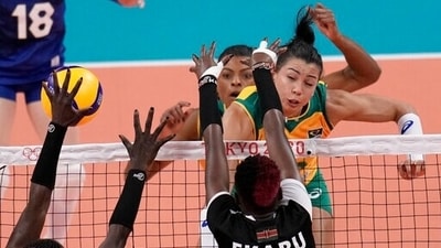 Brazil's Ana Carolina da Silva spikes a ball during a women's volleyball preliminary round pool A match against Kenya, at the 2020 Summer Olympics, Monday, Aug. 2, 2021, in Tokyo, Japan.(AP Photo/Manu Fernandez) (AP) Brazil's Ana Carolina da Silva spikes a ball during a women's volleyball preliminary round pool A match against Kenya, at the 2020 Summer Olympics, Monday, Aug. 2, 2021, in Tokyo, Japan.(AP Photo/Manu Fernandez) (AP)