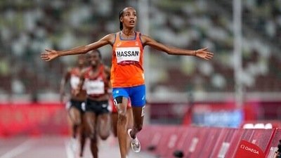Sifan Hassan, of Netherlands, celebrates as she crosses the finish line to win the women's 5,000-meters final at the 2020 Summer Olympics, Monday, Aug. 2, 2021, in Tokyo. (AP Photo/Petr David Josek) (AP) Sifan Hassan, of Netherlands, celebrates as she crosses the finish line to win the women's 5,000-meters final at the 2020 Summer Olympics, Monday, Aug. 2, 2021, in Tokyo. (AP Photo/Petr David Josek) (AP)