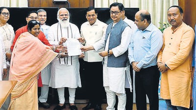 BJP MPs from the North-East meet PM Narendra Modi to submit a memorandum on various issues pertaining to the region, including the Assam-Mizoram border row, in New Delhi on Monday. (ANI) BJP MPs from the North-East meet PM Narendra Modi to submit a memorandum on various issues pertaining to the region, including the Assam-Mizoram border row, in New Delhi on Monday. (ANI)