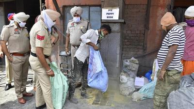 Amritsar, India – June 26: Punjab Police team destroying a huge quantity of drugs seized during the period of last a few years on the occasion of international day against drug abuse and illicit trafficking at Khanna Paper Mills, on June 26, 2021 in Amritsar, India. (Photo by Sameer Sehgal /Hindustan Times) (HT FILE ) Amritsar, India – June 26: Punjab Police team destroying a huge quantity of drugs seized during the period of last a few years on the occasion of international day against drug abuse and illicit trafficking at Khanna Paper Mills, on June 26, 2021 in Amritsar, India. (Photo by Sameer Sehgal /Hindustan Times) (HT FILE )