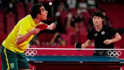 Brazil's Hugo Calderano, left, competes during the table tennis men's team quarterfinal against South Korea's Jang Woo-jin at the 2020 Summer Olympics, Monday, Aug. 2, 2021, in Tokyo, Japan. (AP Photo/Vincent Thian) (AP) Brazil's Hugo Calderano, left, competes during the table tennis men's team quarterfinal against South Korea's Jang Woo-jin at the 2020 Summer Olympics, Monday, Aug. 2, 2021, in Tokyo, Japan. (AP Photo/Vincent Thian) (AP)