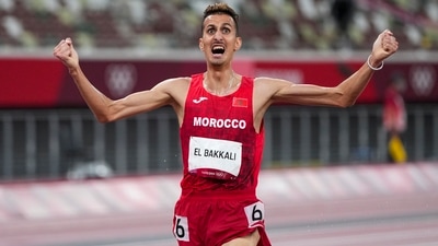 Tokyo : Soufiane El Bakkali, of Morocco, celebrates after winning the men's 3,000-meter steeplechase final at the 2020 Summer Olympics, Monday, Aug. 2, 2021, in Tokyo.AP/PTI Photo(AP08_02_2021_000284B) (AP) Tokyo : Soufiane El Bakkali, of Morocco, celebrates after winning the men's 3,000-meter steeplechase final at the 2020 Summer Olympics, Monday, Aug. 2, 2021, in Tokyo.AP/PTI Photo(AP08_02_2021_000284B) (AP)