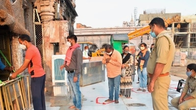 Devotees queued up outside the Kashi Vishwanath temple. (PTI file photo) Devotees queued up outside the Kashi Vishwanath temple. (PTI file photo)