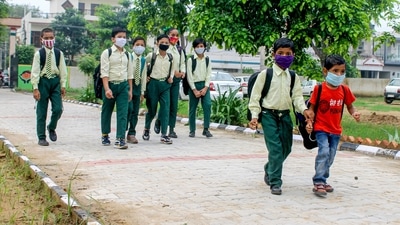 Patiala: Chiildren walk towards their school after ease in COVID-induced restrictions, in Patiala on Monday, Aug 2, 2021. (PTI)