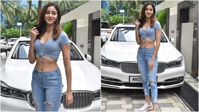 Ananya's half sleeve crop top featured a front tie that cinched the top from the middle. The V neckline, short hem and bodycon silhouette added a chic twist to her glam look. (Varinder Chawla) Ananya's half sleeve crop top featured a front tie that cinched the top from the middle. The V neckline, short hem and bodycon silhouette added a chic twist to her glam look. (Varinder Chawla)