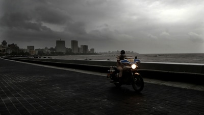 A police man patrols on the promenade of Marin drive in Mumbai. (AP Photo) A police man patrols on the promenade of Marin drive in Mumbai. (AP Photo)