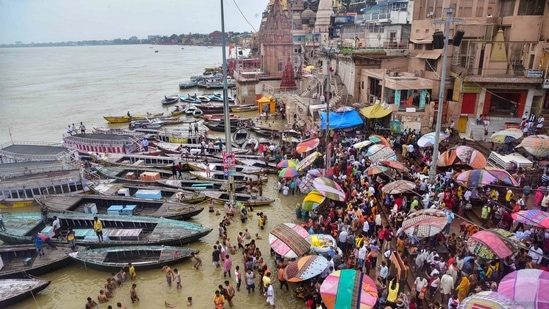 People were seen flouting COVID-19 protocols. Only a handful of devotees were seen wearing masks and practising social distancing. Devotees said that they are not scared of anyone when they are in Lord Shiva's place.(PTI)