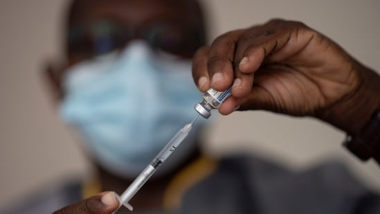 A health worker prepares a dose of Janssen Johnson &amp; Johnson Covid-19 vaccine at Leopold Sedar Senghor stadium in Dakar, Senegal.(AP Photo)
