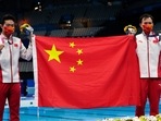 Olympics: China's Xie and Wang sweep top two medals in men's 3m springboard. Olympics: China's Xie and Wang sweep top two medals in men's 3m springboard.
