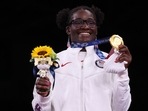 Gold medalist USA's Tamyra Marianna Stock Mensah poses with her medal after the women's freestyle 68kg wrestling competition of the Tokyo 2020 Olympic Games