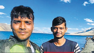 The plucky Sangam city scooterists at Pangong lake (HT photo) The plucky Sangam city scooterists at Pangong lake (HT photo)