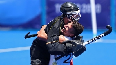Tokyo 2020 Olympics - Hockey - Men - Semifinal - India v Belgium - Oi Hockey Stadium, Tokyo, Japan - August 3, 2021. Simon Gougnard of Belgium and Vincent Vanasch of Belgium celebrate after winning their match. REUTERS/Amr Abdallah Dalsh (REUTERS)