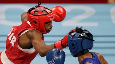 Tokyo 2020 Olympics - Boxing - Women's Lightweight - Quarterfinal - Kokugikan Arena - Tokyo, Japan - August 3, 2021 Caroline Sara Dubois of Britain in action against Sudaporn Seesondee of Thailand REUTERS/Ueslei Marcelino (REUTERS)