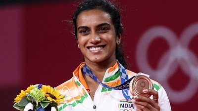 India's PV Sindhu poses with her bronze medal in women's singles badminton event at the Tokyo Olympics 2020 (Twitter) India's PV Sindhu poses with her bronze medal in women's singles badminton event at the Tokyo Olympics 2020 (Twitter)