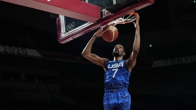 United States' Kevin Durant (7) dunks the ball during men's basketball quarterfinal game against Spain at the 2020 Summer Olympics, in Saitama on August 3. The United States were victorious 95-81 despite a valiant 38-point effort from Spain's Ricky Rubio. Kevin Durant led Team USA to a decisive victory earning a ticket to the semifinals. (Eric Gay / AP) United States' Kevin Durant (7) dunks the ball during men's basketball quarterfinal game against Spain at the 2020 Summer Olympics, in Saitama on August 3. The United States were victorious 95-81 despite a valiant 38-point effort from Spain's Ricky Rubio. Kevin Durant led Team USA to a decisive victory earning a ticket to the semifinals. (Eric Gay / AP)