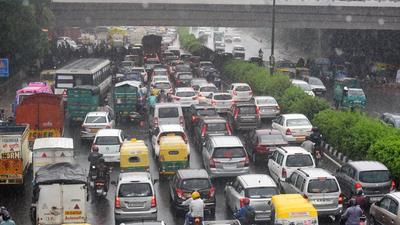 New Delhi, India - July 29, 2021: Slow moving traffic at Kashmiri Gate near ISBT while it rains in New Delhi, India, on Thursday, July 29, 2021. (Photo by Raj K Raj / Hindustan Times) (Raj K Raj / HT Photo) New Delhi, India - July 29, 2021: Slow moving traffic at Kashmiri Gate near ISBT while it rains in New Delhi, India, on Thursday, July 29, 2021. (Photo by Raj K Raj / Hindustan Times) (Raj K Raj / HT Photo)