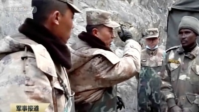 Besides interviews of Chen’s family members, including his wife, the video shows edited footage of the clash between the two armies. (CCTV via AP Video) (AP)