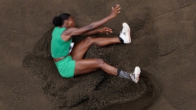 Ese Brume of Nigeria in action during the Women's Long Jump Final at Olympic Stadium in Tokyo on August 3. Brume, who led after the first round and was in top spot again after the fourth, finished on 6.97-meters and took bronze on a countback. (Fabrizio Bensch / REUTERS) Ese Brume of Nigeria in action during the Women's Long Jump Final at Olympic Stadium in Tokyo on August 3. Brume, who led after the first round and was in top spot again after the fourth, finished on 6.97-meters and took bronze on a countback. (Fabrizio Bensch / REUTERS)