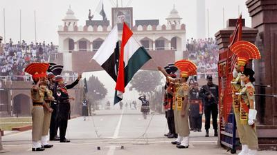 BSF and Pakistan Rangers soldiers lowering the countries' flags at the beating retreat ceremony at Attari- Wagah border. (Representational image/PTI) BSF and Pakistan Rangers soldiers lowering the countries' flags at the beating retreat ceremony at Attari- Wagah border. (Representational image/PTI)