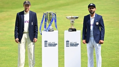 England's captain Joe Root (L) and India's captain Virat Kohli (R) pose with the Pataudi Trophy (CR) and the Test series trophy (CL) at Trent Bridge Cricket Ground in Nottingham. (Twitter) England's captain Joe Root (L) and India's captain Virat Kohli (R) pose with the Pataudi Trophy (CR) and the Test series trophy (CL) at Trent Bridge Cricket Ground in Nottingham. (Twitter)