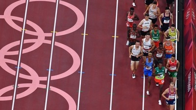 An overview shows athletes as they compete in the men's 5000m heats during the Tokyo 2020 Olympic Games at the Olympic Stadium in Tokyo on August 3, 2021. (Photo by Antonin THUILLIER / AFP) (AFP) An overview shows athletes as they compete in the men's 5000m heats during the Tokyo 2020 Olympic Games at the Olympic Stadium in Tokyo on August 3, 2021. (Photo by Antonin THUILLIER / AFP) (AFP)