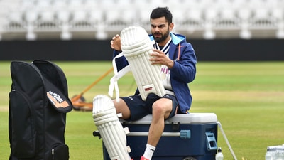 India captain Virat Kohli pads up during net practice prior to the first Test Match between England and India at Trent Bridge cricket ground in Nottingham, England. (AP)