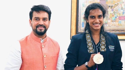 Union Minister for Youth Affairs & Sports Anurag Thakur with Bronze medalist in Tokyo Olympics, shuttler PV Sindhu (PTI) Union Minister for Youth Affairs & Sports Anurag Thakur with Bronze medalist in Tokyo Olympics, shuttler PV Sindhu (PTI)