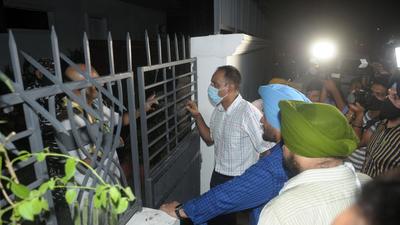Punjab vigilance team outside former Punjab DGP Sumedh Singh Saini’s house in Chandigarh. (HT file)