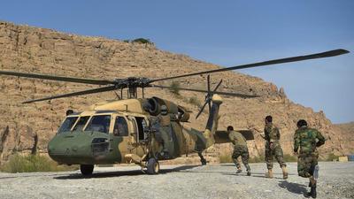 Afghan National Army soldiers unload food items and petrol oil from an Afghan Air Force Black Hawk helicopter at the hydroelectric Kajaki Dam in Kajaki, northeast of Helmand Province. (Representational image/AFP) Afghan National Army soldiers unload food items and petrol oil from an Afghan Air Force Black Hawk helicopter at the hydroelectric Kajaki Dam in Kajaki, northeast of Helmand Province. (Representational image/AFP)