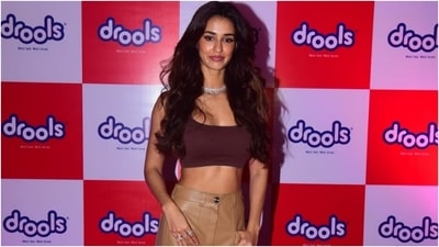 Disha chose glossy pink lip shade, mascara on the lashes, sleek eyeliner, dewy face and blushed cheeks to glam up her look. What do you think of her glam outfit? (Varinder Chawla)