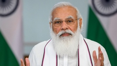 Meanwhile, in a virtual interaction with the Pradhan Mantri Garib Kalyan Anna Yojana (PM-GKAY) beneficiaries in Gujarat, PM Modi said that the scheme helped lakhs of poor people during the pandemic. (PTI) Meanwhile, in a virtual interaction with the Pradhan Mantri Garib Kalyan Anna Yojana (PM-GKAY) beneficiaries in Gujarat, PM Modi said that the scheme helped lakhs of poor people during the pandemic. (PTI)