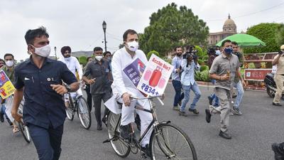 Congress leader Rahul Gandhi rides bicycle in a symbolic protest over fuel price hike at the Constitution Club in New Delhi on Tuesday. (PTI) Congress leader Rahul Gandhi rides bicycle in a symbolic protest over fuel price hike at the Constitution Club in New Delhi on Tuesday. (PTI)