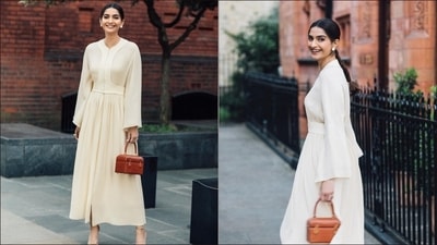 Another date night with Anand Ahuja in London saw Sonam Kapoor Ahuja channelling the strength of a simplistic silhouette in a cream-coloured round-neck silk top that came with drooping shoulders and wide sleeves and was held at the waist with a dramatic cloth harness that wounded around her neck. Sonam teamed it with a seashell-coloured ankle-length skirt in fluid silk crepe that she wore around her mid-waist and cut an a-line silhouette with a side zip closure. Completing her look with a pair of sleek soft gold heels from Aquazzura, Sonam accessorised her look with a pair of round precious stone-studded earrings, a finger ring and a lunch box-shaped brown leather handbag worth  <span class='webrupee'>₹</span>1.8 lakh. (Instagram/sonamkapoor)