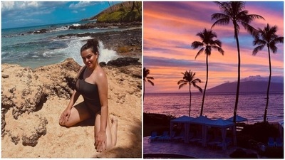 Trishala Dutt posing in the sand.