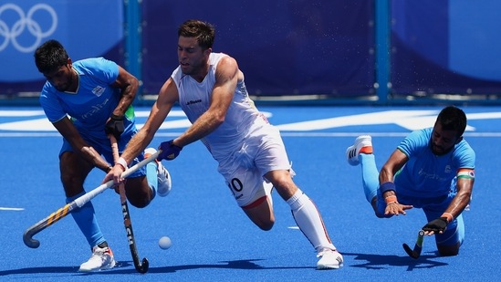 Cedric Charlier of Belgium in action against Varun Kumar and Manpreet Singh of India during Hockey Men’s Semifinal at Oi Hockey Stadium in Tokyo on August 3. World champions Belgium earned a spot in the men's hockey finals at the Tokyo Games after beating India 5-2. Belgium will now face Australia or Germany in the gold medal match on August 5, while India will play for bronze.(Amr Abdallah Dalsh / REUTERS)