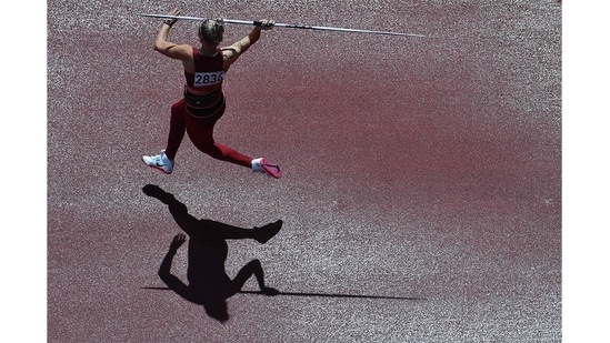 Latvia's Madara Palameika competes in the women's javelin throw qualification during the 2020 Summer Olympic Games at the Olympic Stadium in Tokyo on August 3. Croatian Sara Kolak's title defence came to a disastrous end as she committed three fouls and was out at the women's javelin qualifier. Polish athlete Maria Andrejczyk, who underwent surgery in March 2020 due to ankle and Achilles tendon injuries, advanced to the final with 65.24 metres in the day's farthest throw.(Antonin Thuillier / AFP)