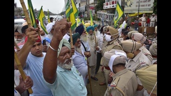 Farmer union members shouting slogans against BJP leaders in Ludhiana on Tuesday.