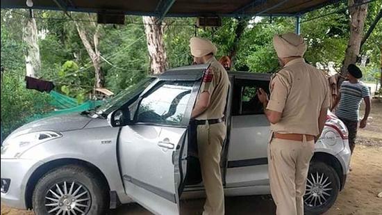 Police investigating the crime spot near Samrala on Tuesday. (HT PHOTO)