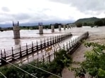 Two bridges on Datia-Gwalior road were damaged due to strong currents of the Sindh River in Datia on Tuesday. (ANI Photo) Two bridges on Datia-Gwalior road were damaged due to strong currents of the Sindh River in Datia on Tuesday. (ANI Photo)